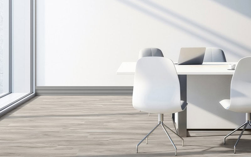 Wall Base Harmony Base Sculptures In An Office Chair Setting