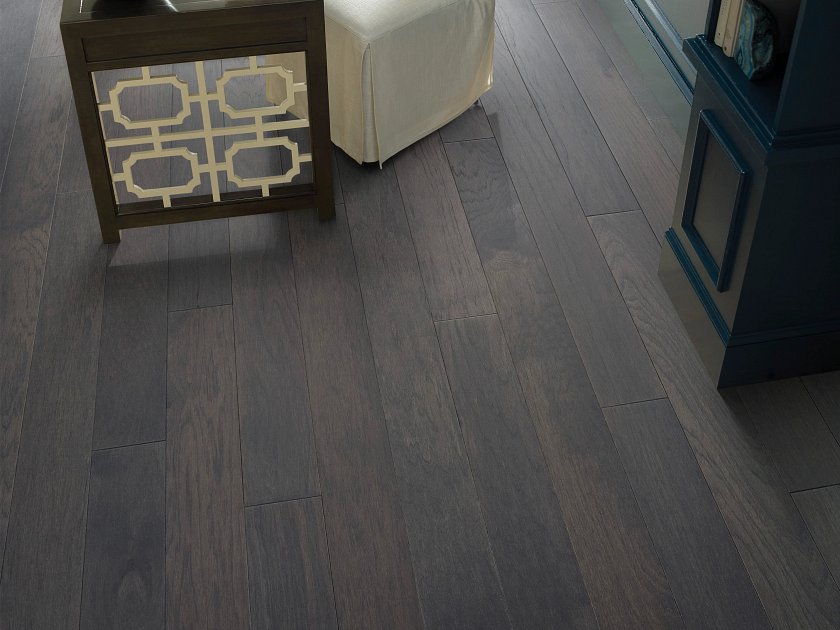 Shaw Northington Smooth Sable engineered hardwood flooring in a living room, where natural wood wood tones sit naturally with the furniture layout.