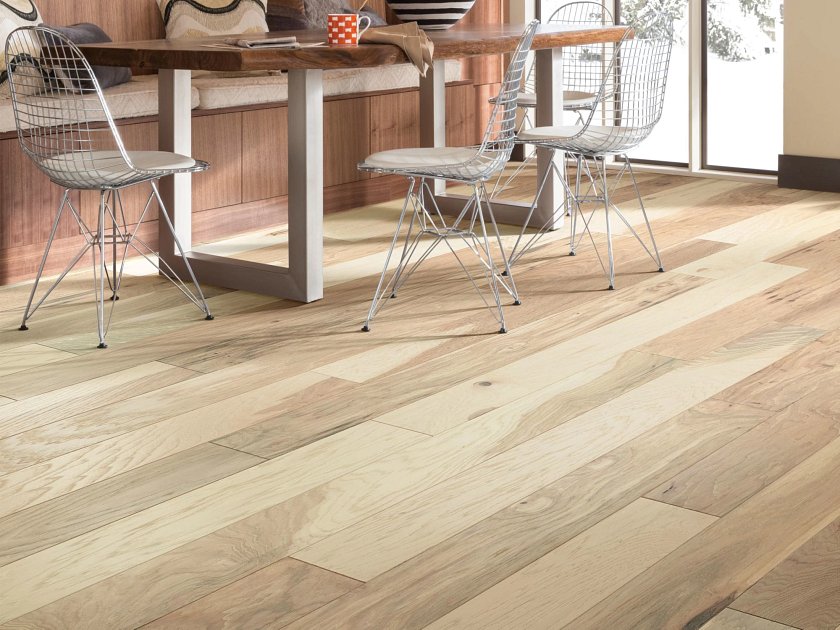 Shaw Northington Brushed Canopy engineered hardwood flooring gives this dining area a polished look, with natural wood color around the furniture layout.