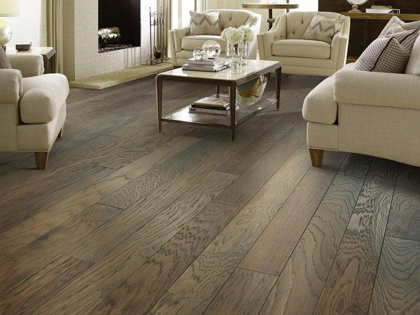 Living room view of Shaw Northington Brushed Chestnut engineered hardwood flooring, showing natural wood hardwood color near the furniture layout.