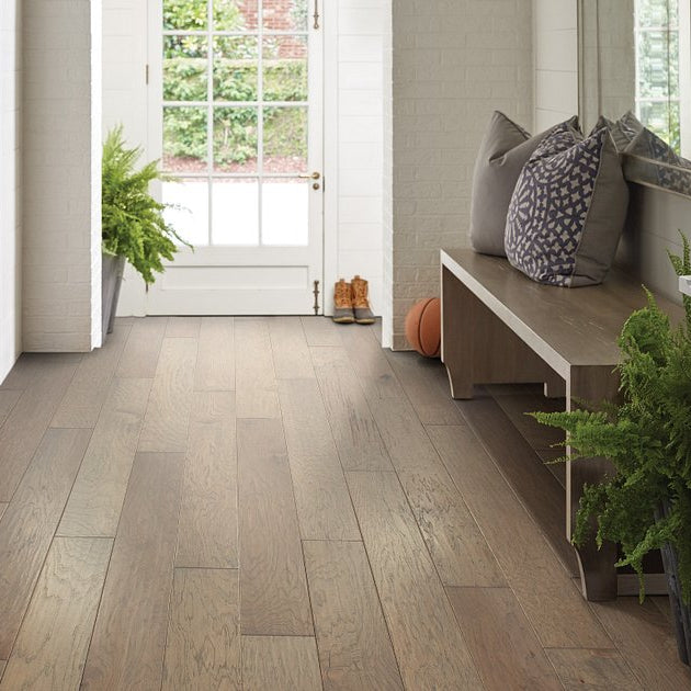 Shaw Riverstone Mesquite engineered hardwood flooring in a living room, where natural wood wood tones sit naturally with the furniture layout.