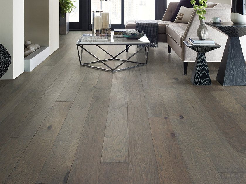 Living room room view with Shaw Alpine Hickory Dogwood engineered hardwood flooring in a natural wood hardwood finish.