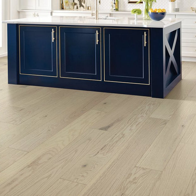 Shaw Exploration Oak Passage engineered hardwood flooring shapes this living room with natural wood color around the furniture layout.