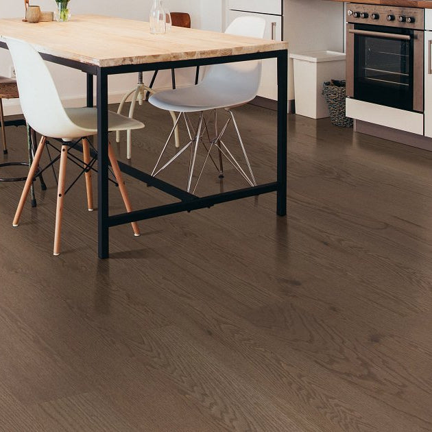 Living room view of Shaw Exploration Oak Vale engineered hardwood flooring, showing natural wood hardwood color near the furniture layout.