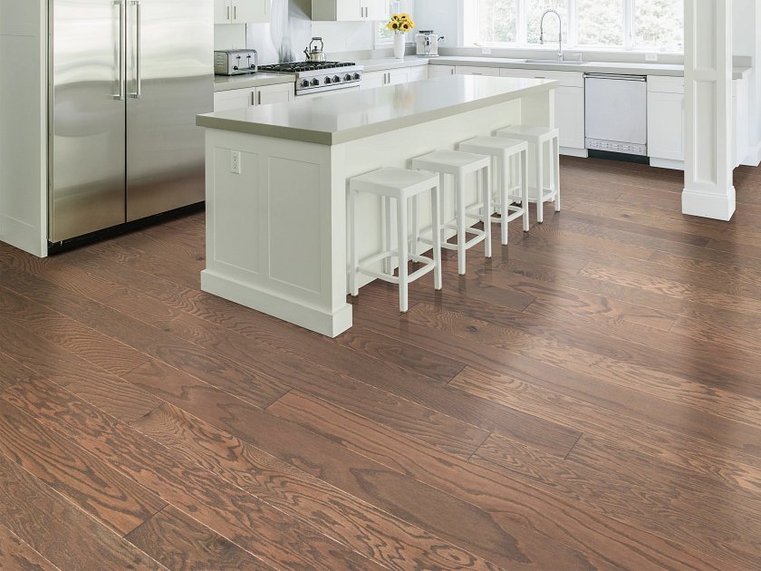Shaw Albright Oak 5.0 Flax Seed Lg engineered hardwood flooring photographed in a living room, pairing natural wood hardwood with sofa seating and the open floor area.