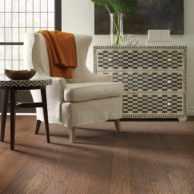 Living room room view with Shaw Pebble Hill 6 3/8 Canyon engineered hardwood flooring in a natural wood hardwood finish.