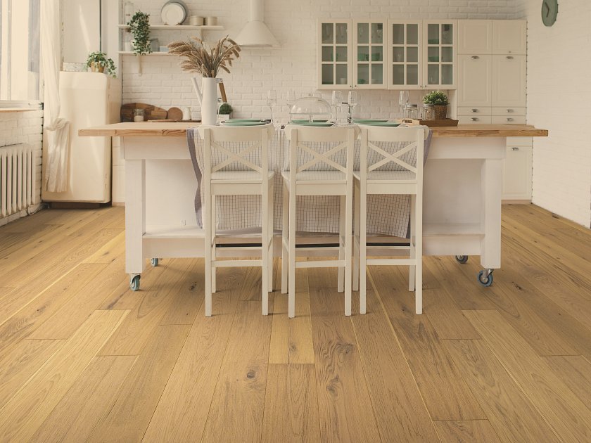 Shaw Utmost Endeavor engineered hardwood flooring gives this living room a polished look, with natural wood color around the furniture layout.