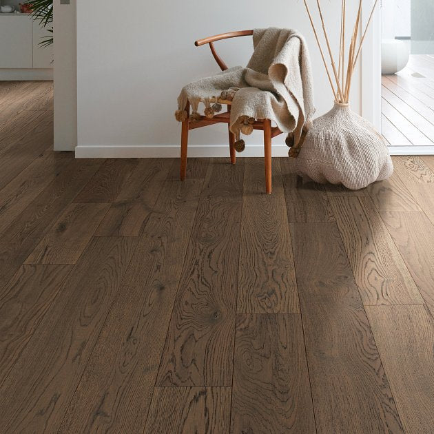 Living room room view with Shaw Utmost Grounded engineered hardwood flooring in a natural wood hardwood finish.
