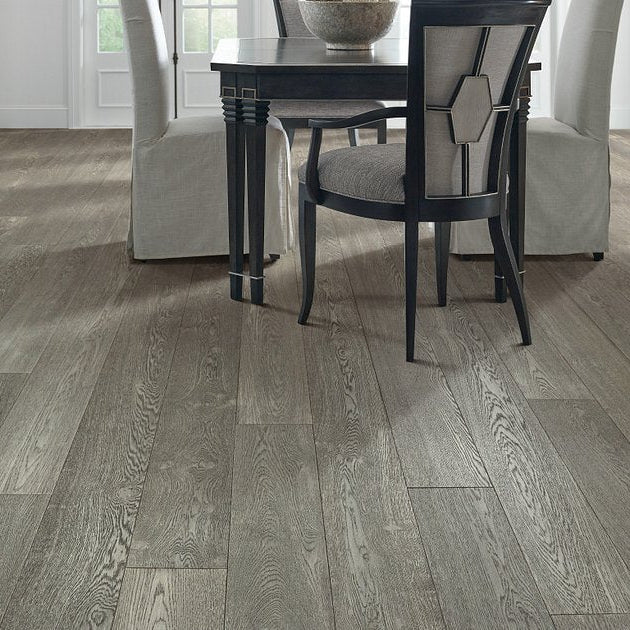 Shaw Ensemble Chateau engineered hardwood flooring in a living room, where natural wood wood tones sit naturally with the furniture layout.