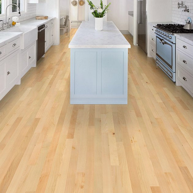 Shaw Natural Classics Hard Maple engineered hardwood flooring shapes this living room with natural wood color around the furniture layout.