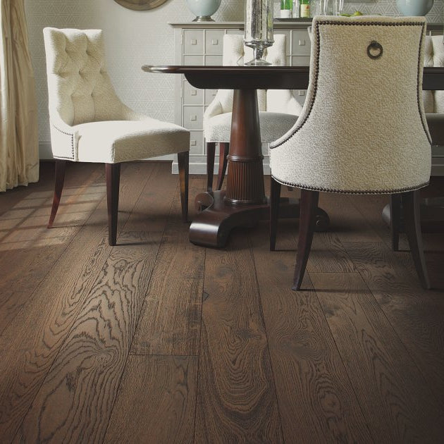 Living room view of Shaw Castlewood Oak Arrow engineered hardwood flooring, showing natural wood hardwood color near the furniture layout.