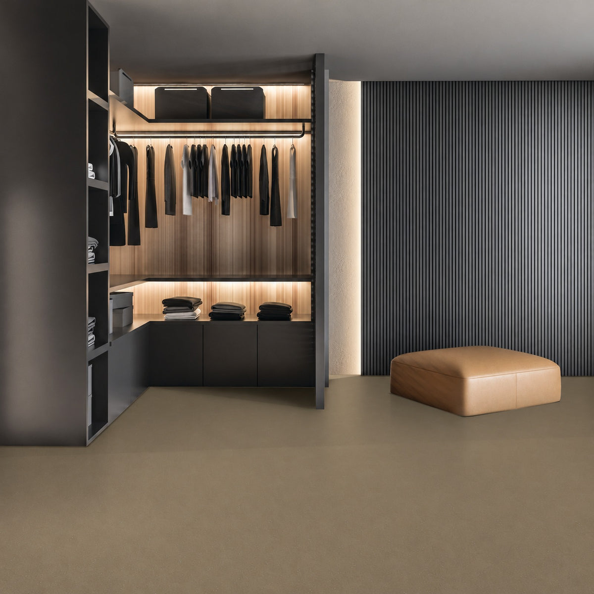 Armstrong Medintone Ginger sheet vinyl, a khaki tan with fine flecks, in a walk-in closet with dark shelving, lit hanging rails and a leather ottoman.