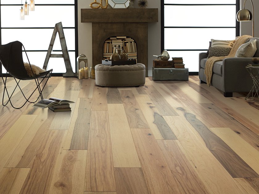 Shaw Sanctuary Hickory Mindful engineered hardwood flooring shown across a living room, highlighting a natural wood hardwood look.