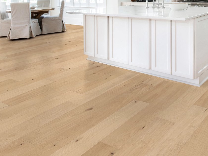 Shaw Utmost Eternal engineered hardwood flooring photographed in a living room, pairing natural wood hardwood with the furniture layout.