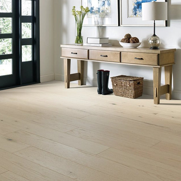 Shaw Sanctuary Oak Serenity engineered hardwood flooring shapes this living room with natural wood color around the furniture layout.