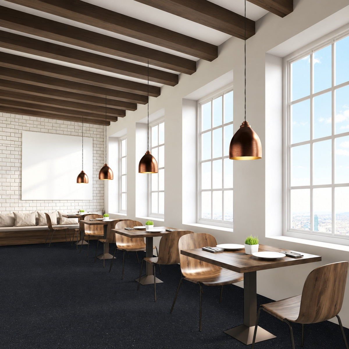 Armstrong Medintone Raven sheet vinyl, a near-black with fine light flecks, in a restaurant dining room with wood tables, copper pendant lights and tall windows.