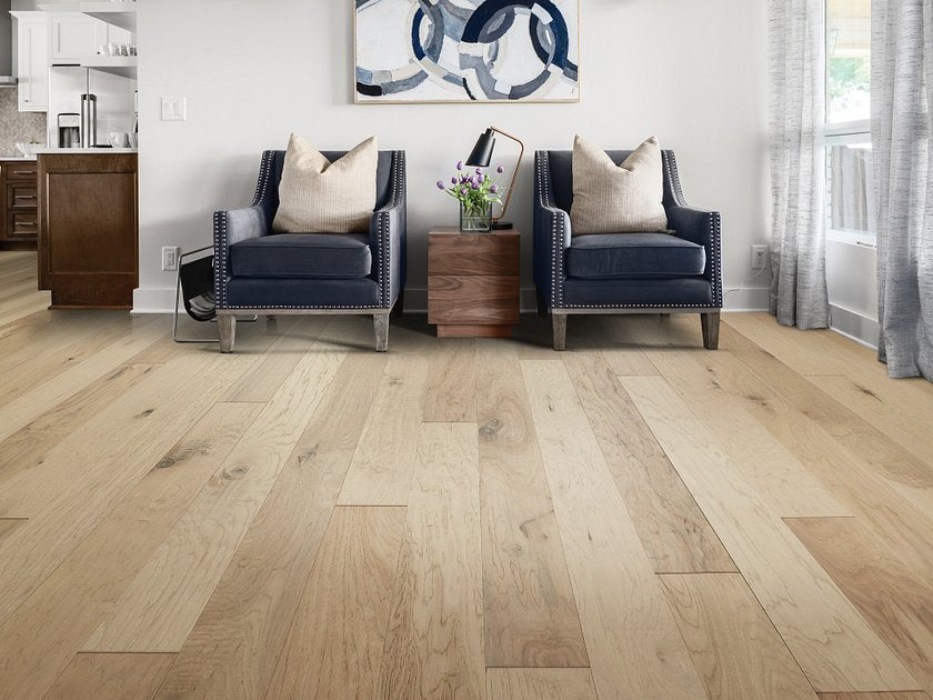 Shaw Pebble Hill Hickory 5 Linen engineered hardwood flooring brings light neutral wood tone to this polished living room room view.