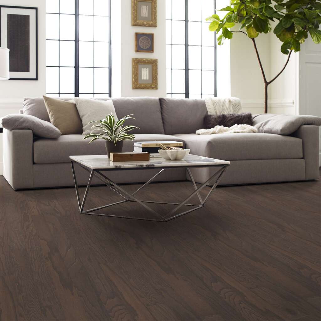Shaw Albright Oak 3.25 Weathered engineered hardwood flooring photographed in a living room, pairing natural wood hardwood with the furniture layout.