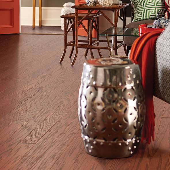 Living room view of Shaw Albright Oak 3.25 Cherry engineered hardwood flooring, showing natural wood hardwood color near the furniture layout.