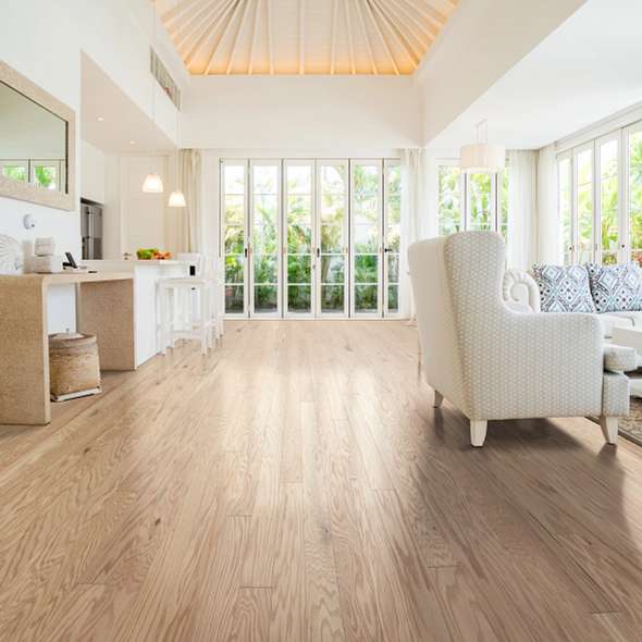 Shaw Albright Oak 3.25 Biscuit Lg engineered hardwood flooring in a living room, where natural wood wood tones sit naturally with the furniture layout.