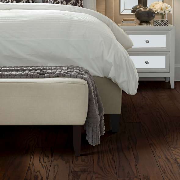 Shaw Albright Oak 5.0 Chocolate engineered hardwood flooring in a living room, where natural wood wood tones sit naturally with the furniture layout.
