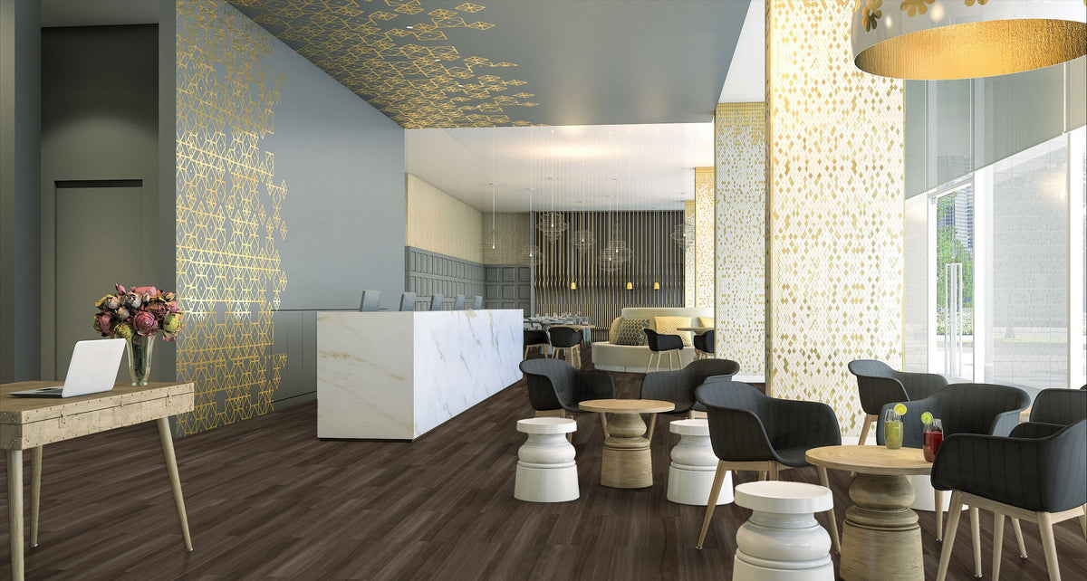Armstrong Biome Selva Arabica luxury vinyl tile (LVT) flooring in a hotel-style lobby with a reception counter, lounge seating, and gold-patterned accents.
