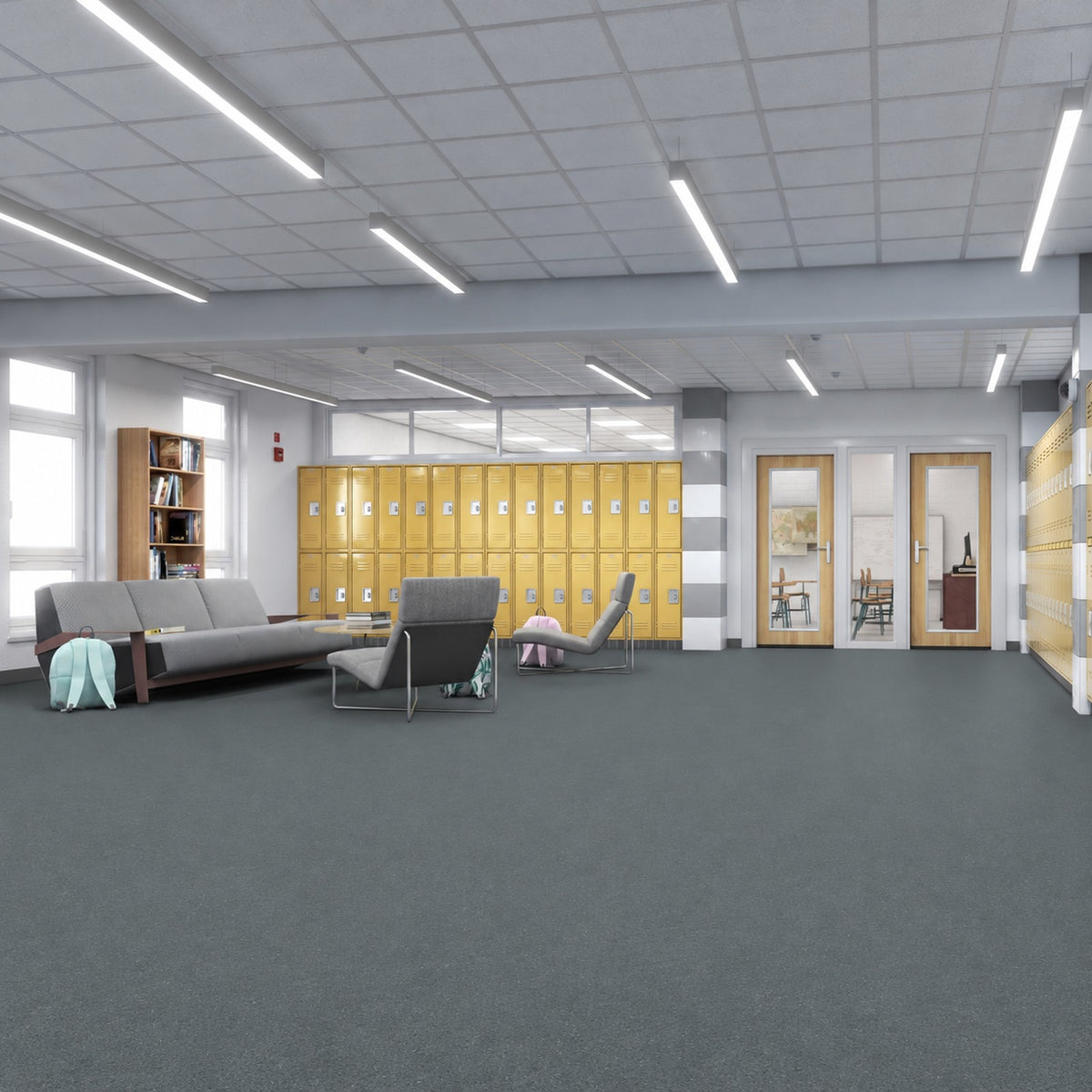 Armstrong Medintone Zephyr sheet vinyl, a dark blue-gray with a fine speckle, in a school commons with yellow lockers, gray lounge seating and classroom doors.