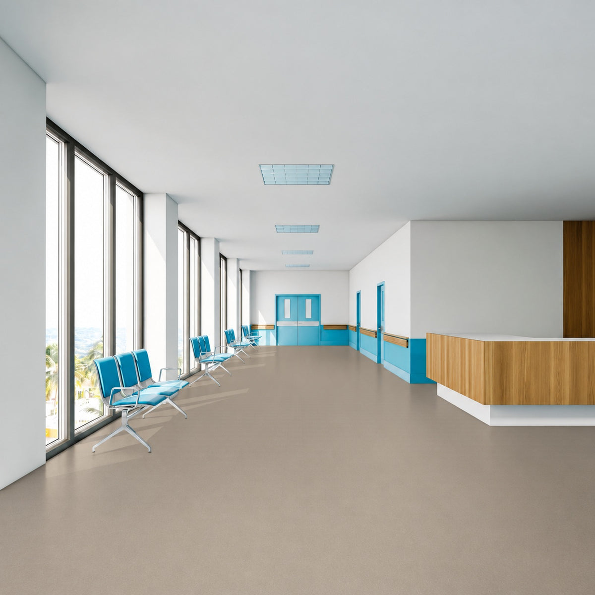 Armstrong Medintone Feathersmooth sheet vinyl, a light taupe, in a healthcare waiting corridor with blue seating, a wood reception desk and tall windows.