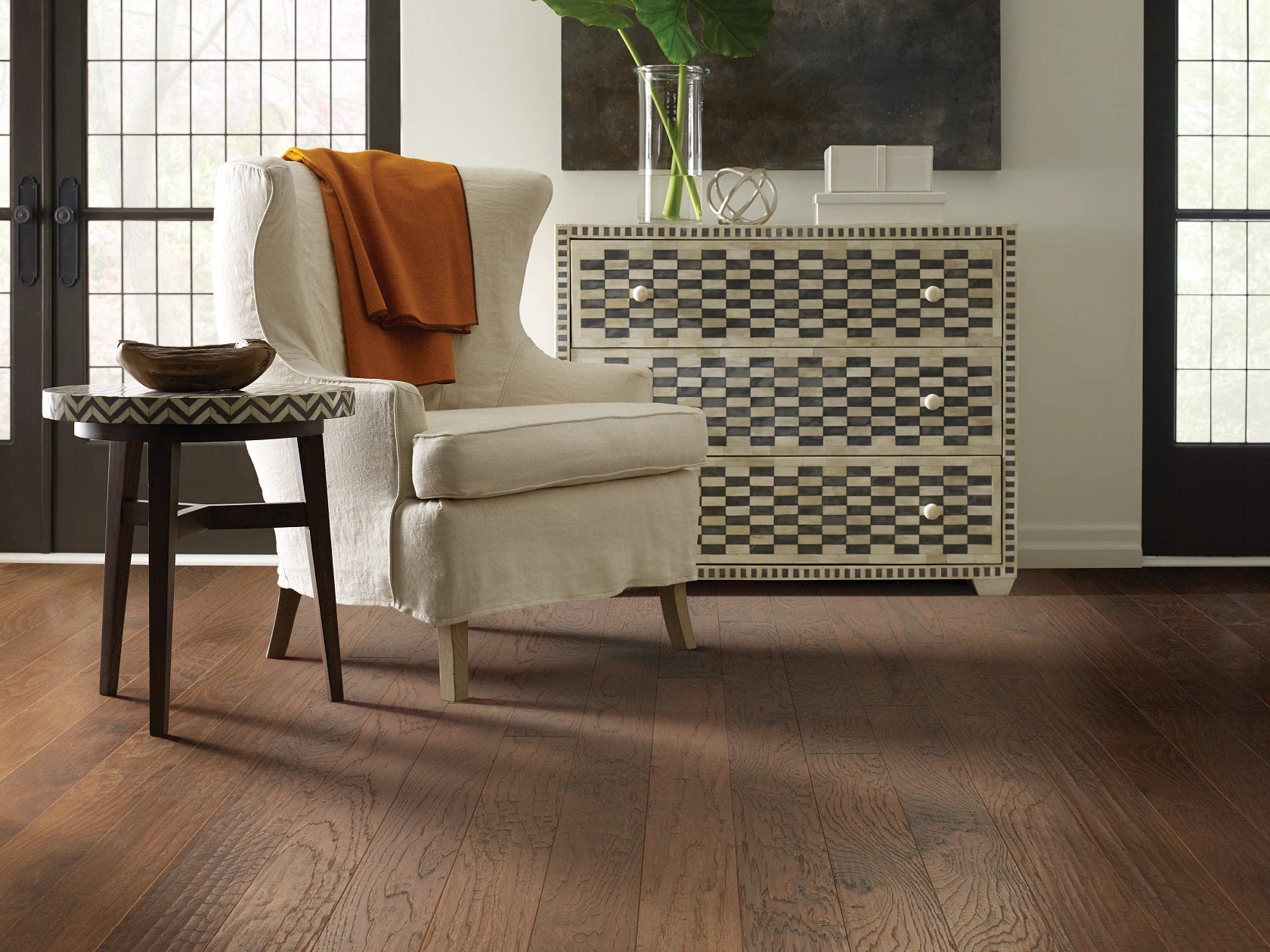 Living room view of Shaw Pebble Hill Hickory 5 Canyon engineered hardwood flooring, showing natural wood hardwood color near the furniture layout.