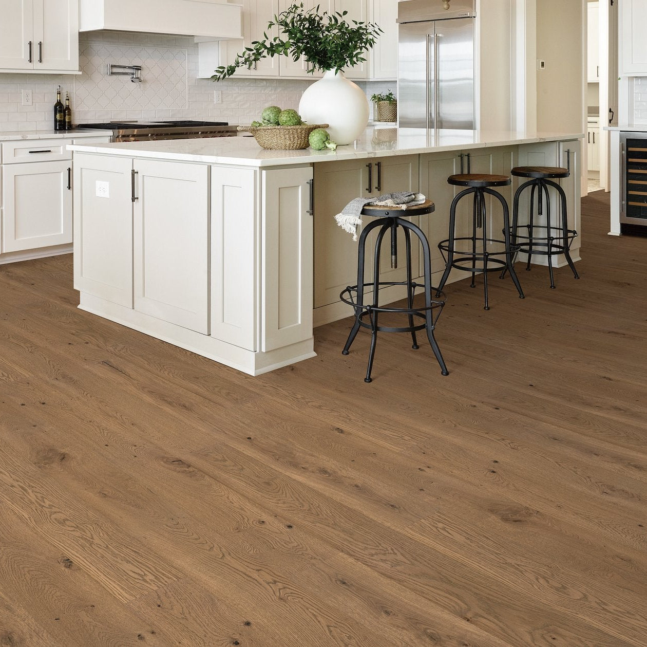 Shaw Castlewood Oak Estate engineered hardwood flooring in a living room, where natural wood wood tones sit naturally with the furniture layout.