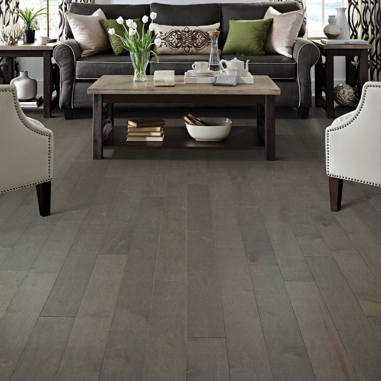 Shaw Eclectic Maple Antebellum engineered hardwood flooring in a bedroom, where natural wood wood tones sit naturally with the bed.