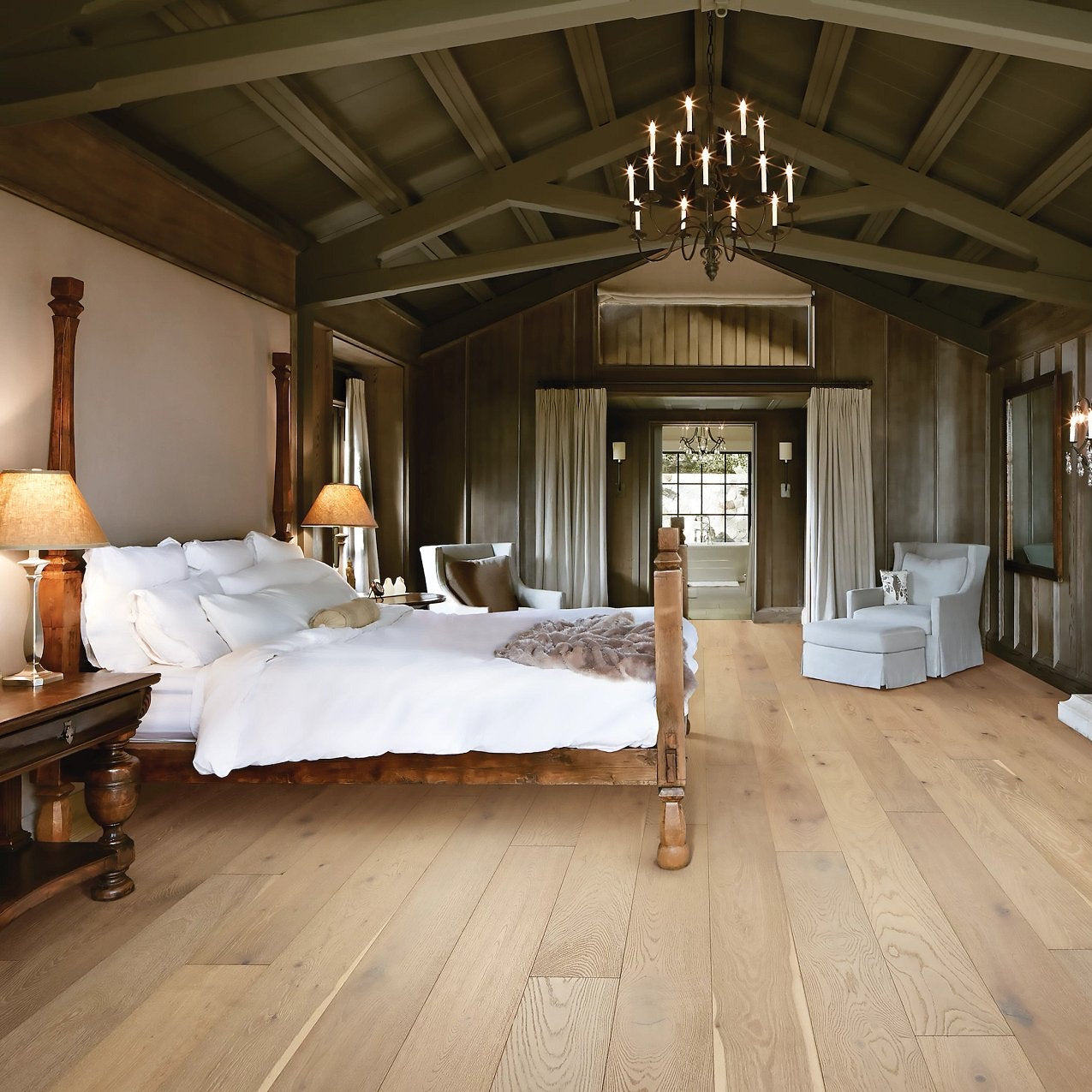 Shaw Expressions Mural engineered hardwood flooring in a living room, where natural wood wood tones sit naturally with sofa seating and the open floor area.