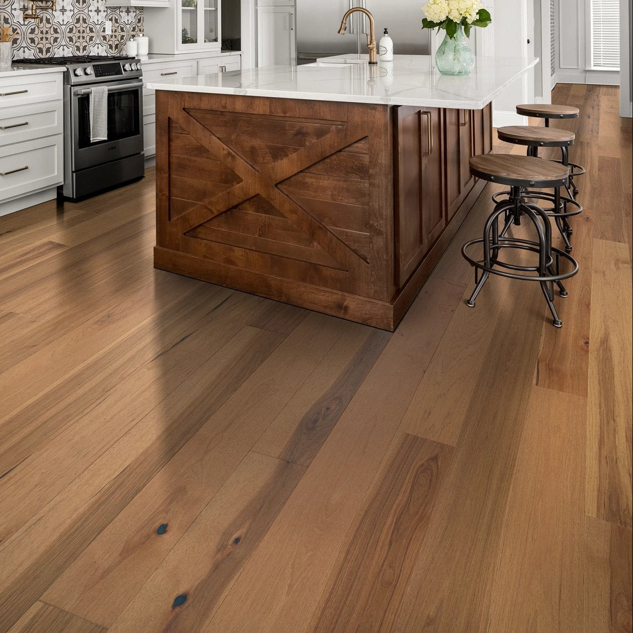 Shaw Exploration Hickory Dune engineered hardwood flooring shapes this living room with natural wood color around the furniture layout.