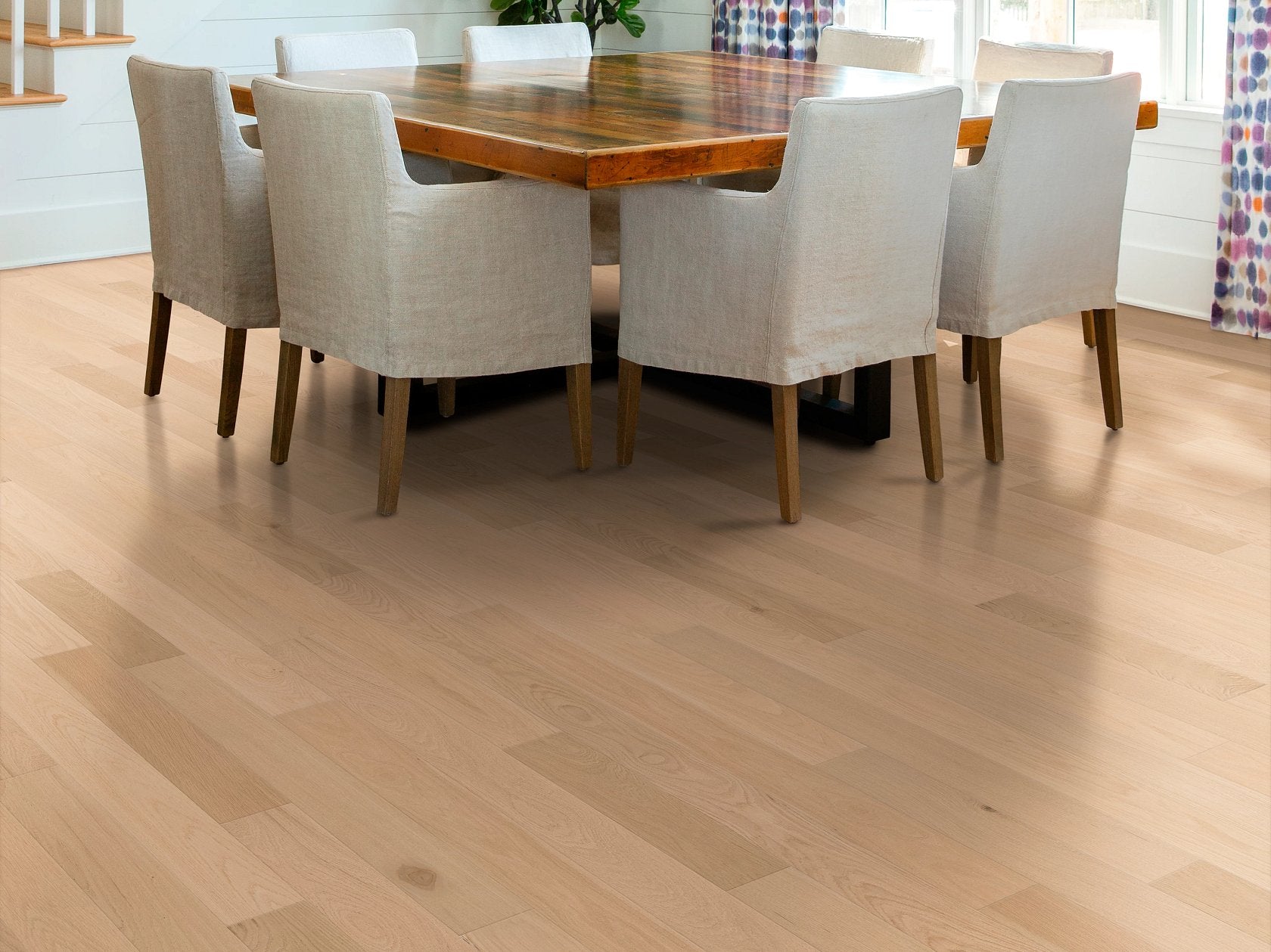 Living room view of Shaw Natural Classics White Oak engineered hardwood flooring, showing natural wood hardwood color near the furniture layout.