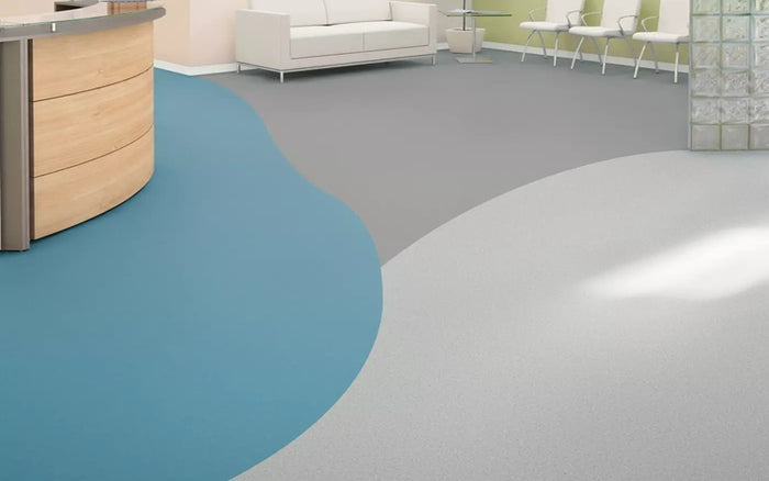 Clean And Modern Waiting Room for a Doctor's Office With A Blue And Grey Wavy Patterned Floor