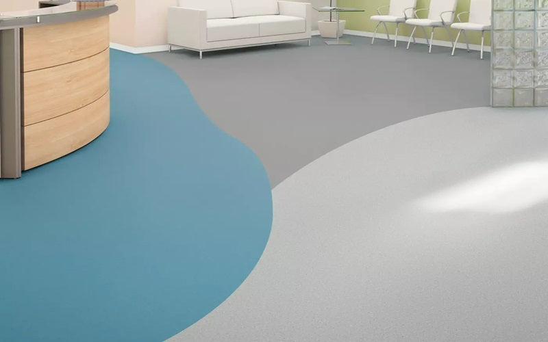 Clean And Modern Waiting Room for a Doctor's Office With A Blue And Grey Wavy Patterned Floor