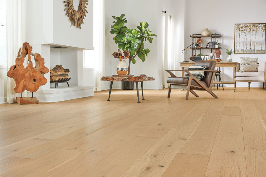 Inviting living space featuring Mohawk TecWood Select Wyndham Farms engineered hardwood flooring, highlighting wide oak planks with natural grain variation and warm, light wood tones.