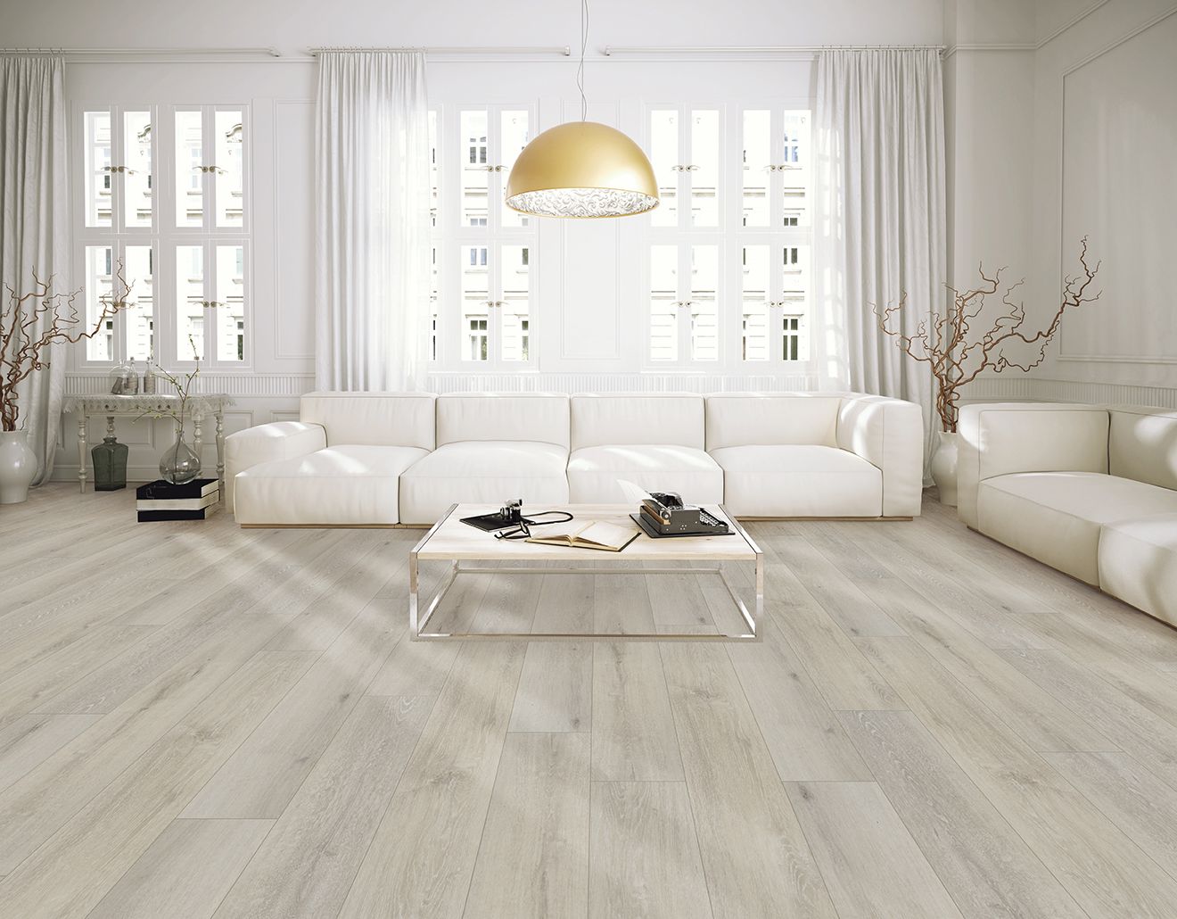 Bright living room with two white armchairs, gold accent table, and Shaw Floorté Classic Ambition Silk luxury vinyl plank flooring in a soft neutral tone.