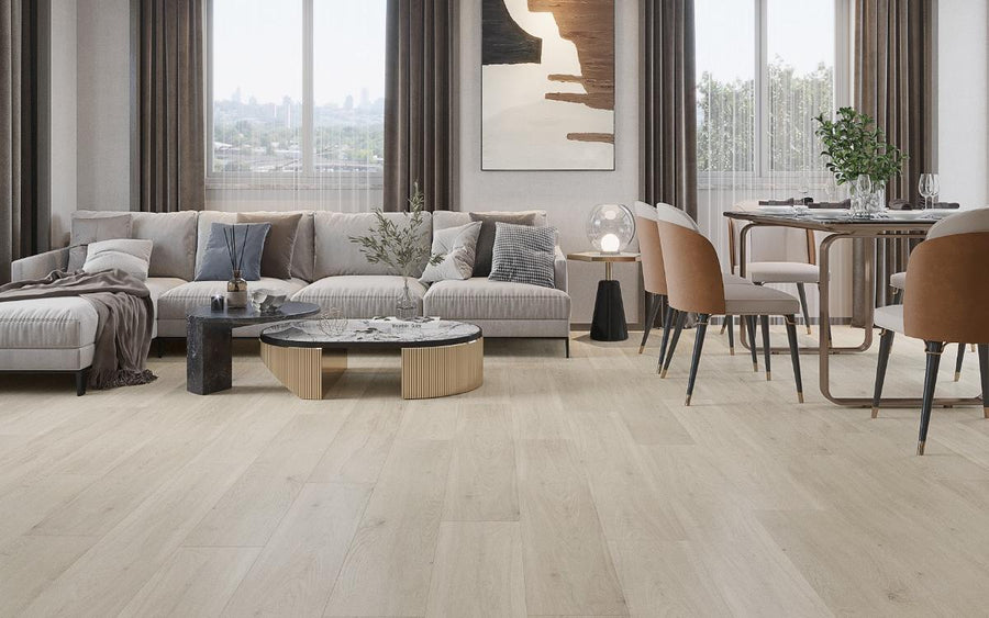 Bright modern living and dining room with Stanton Floors 2000 Addiction SPC luxury vinyl plank flooring in a light natural wood look.