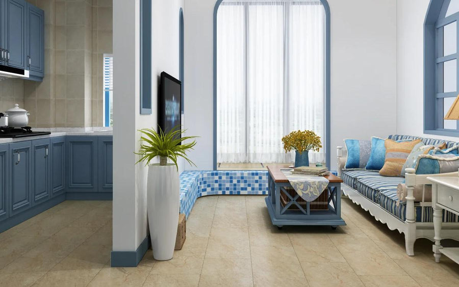 Coastal-inspired kitchen and living room with Stanton Floors 2000 Rejuvenation LVT tile flooring in a beige stone look.