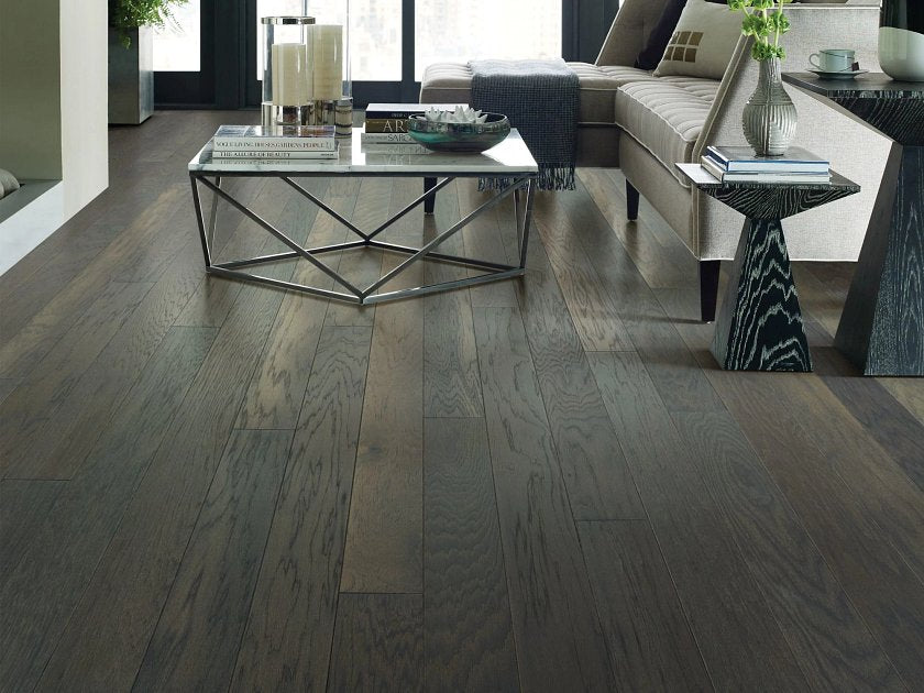 Shaw Northington Brushed Sable engineered hardwood flooring shapes this living room with natural wood color around sofa seating and the open floor area.
