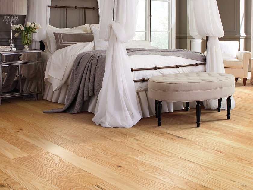 Shaw Albright Oak 5.0 Rustic Natural engineered hardwood flooring shown across a living room, highlighting a natural oak hardwood look.