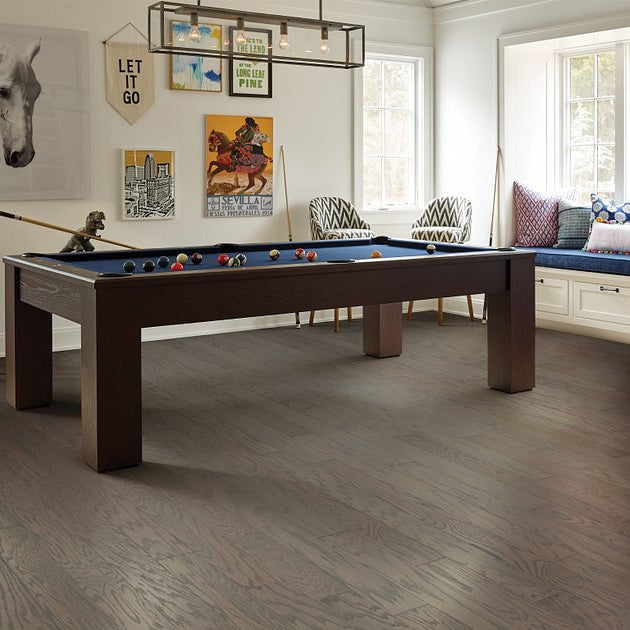 Shaw Albright Oak 5.0 Weathered engineered hardwood flooring in a living room, with natural wood color giving the room a welcoming finished look.