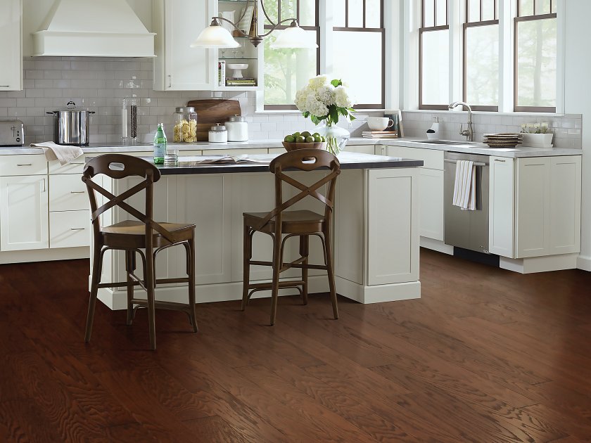Shaw Albright Oak 5.0 Hazelnut engineered hardwood flooring in a living room, with warm hazelnut color giving the room a soft finished look.