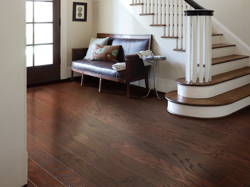 Living room room view with Shaw Albright Oak 5.0 Coffee Bean engineered hardwood flooring in a brown hardwood finish.