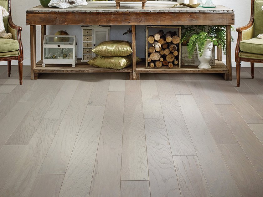 Shaw Alpine Hickory Centennial Grey engineered hardwood flooring adds cool gray hardwood character to this living room setting.