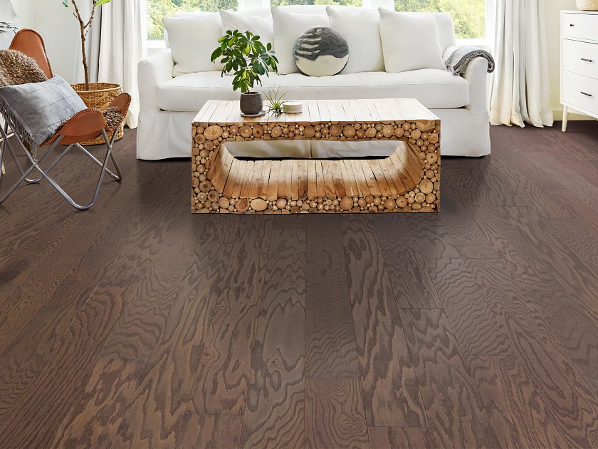 Shaw Albright Oak 5.0 Kona Lg engineered hardwood flooring adds natural wood hardwood character to this living room setting.