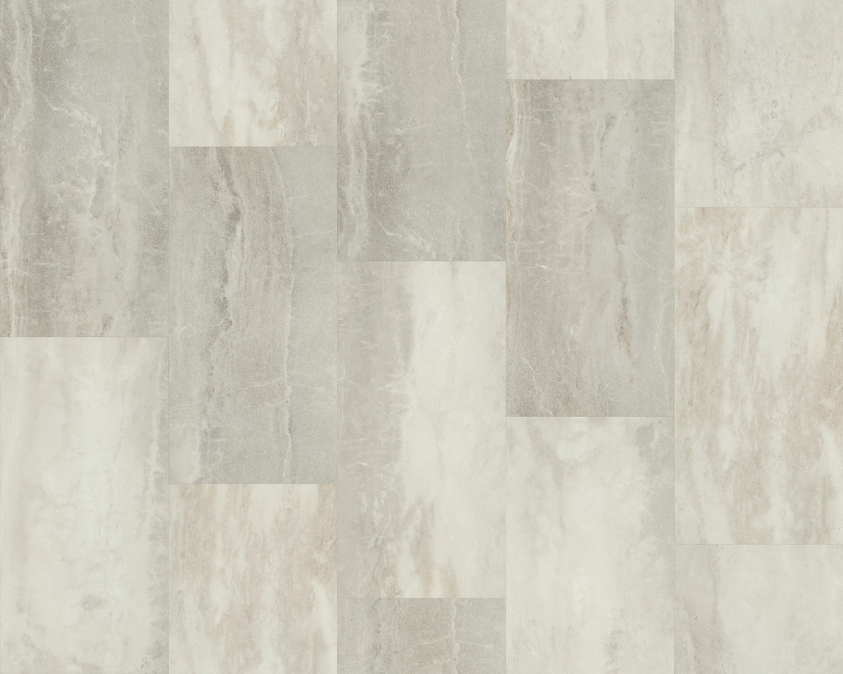 Offset rectangular tiles alternate between creamy white and muted green-gray in Shaw Paragon Tile Plus Mist 1022V-05261, with broad, softly layered stone patterns.