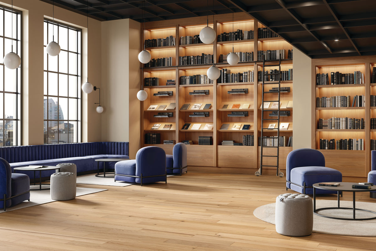 Modern library lounge with blue seating and light Ancient Natural planks from Armstrong TimberTones, SKU LM22K-213S
