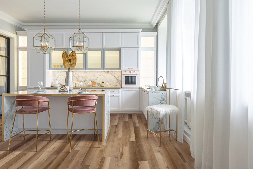 COREtec Dawson Maple WPC Vinyl Plank Flooring VV023-05059 in warm honey-brown tone installed in modern minimalist dining room with natural  mid-century furniture